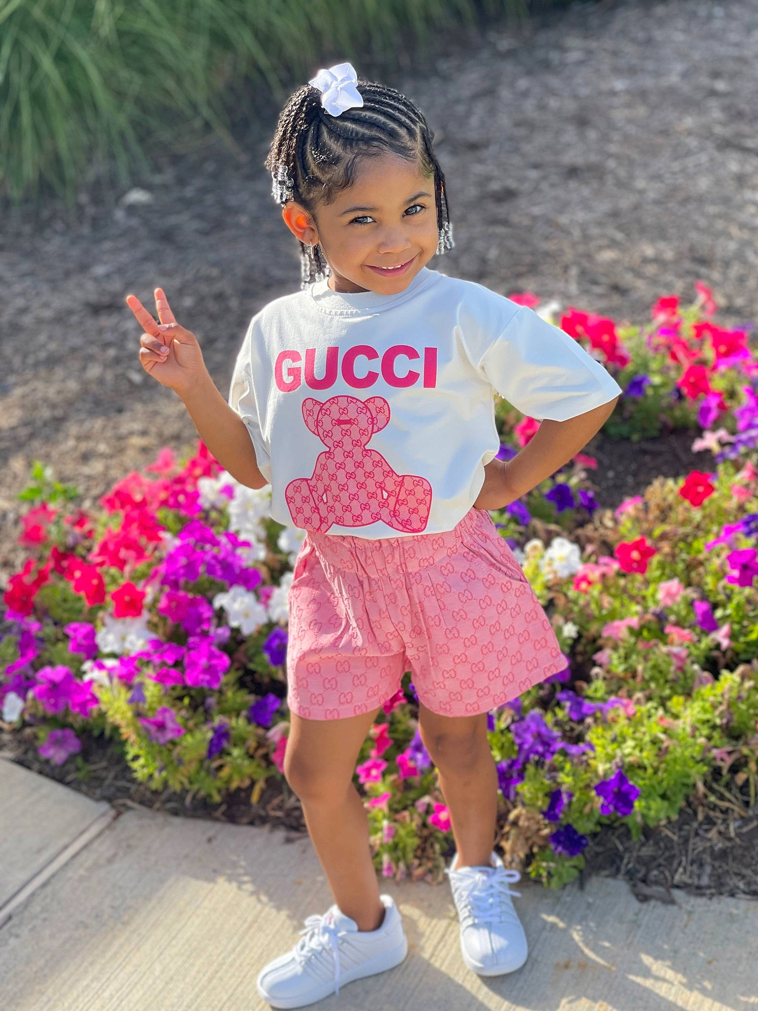 Lovely Michelle is registered to the contest to win money with this photo: baby_toddler_clothing, beauty, botany, facial_expression, flower, fun, grass, happy, headwear, joy, leisure, magenta, people_in_nature, person, photograph, pink, plant, recreation, sleeve, summer