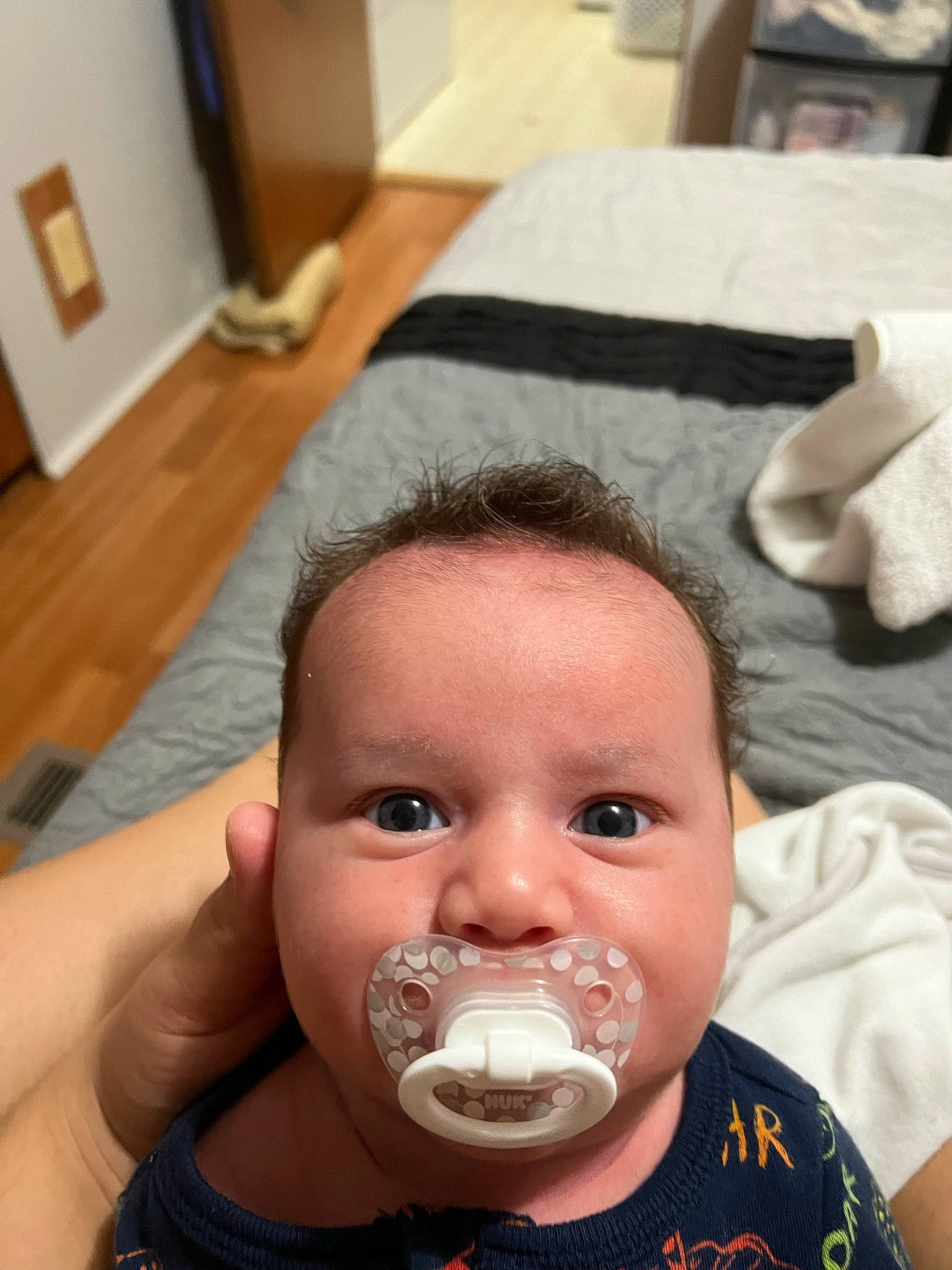 Ezra is registered to the contest to win money with this photo: baby, baby_toddler_clothing, cheek, child, chin, drinkware, ear, eyebrow, eyelash, fun, happy, head, iris, jaw, lip, mouth, neck, nose, person, skin