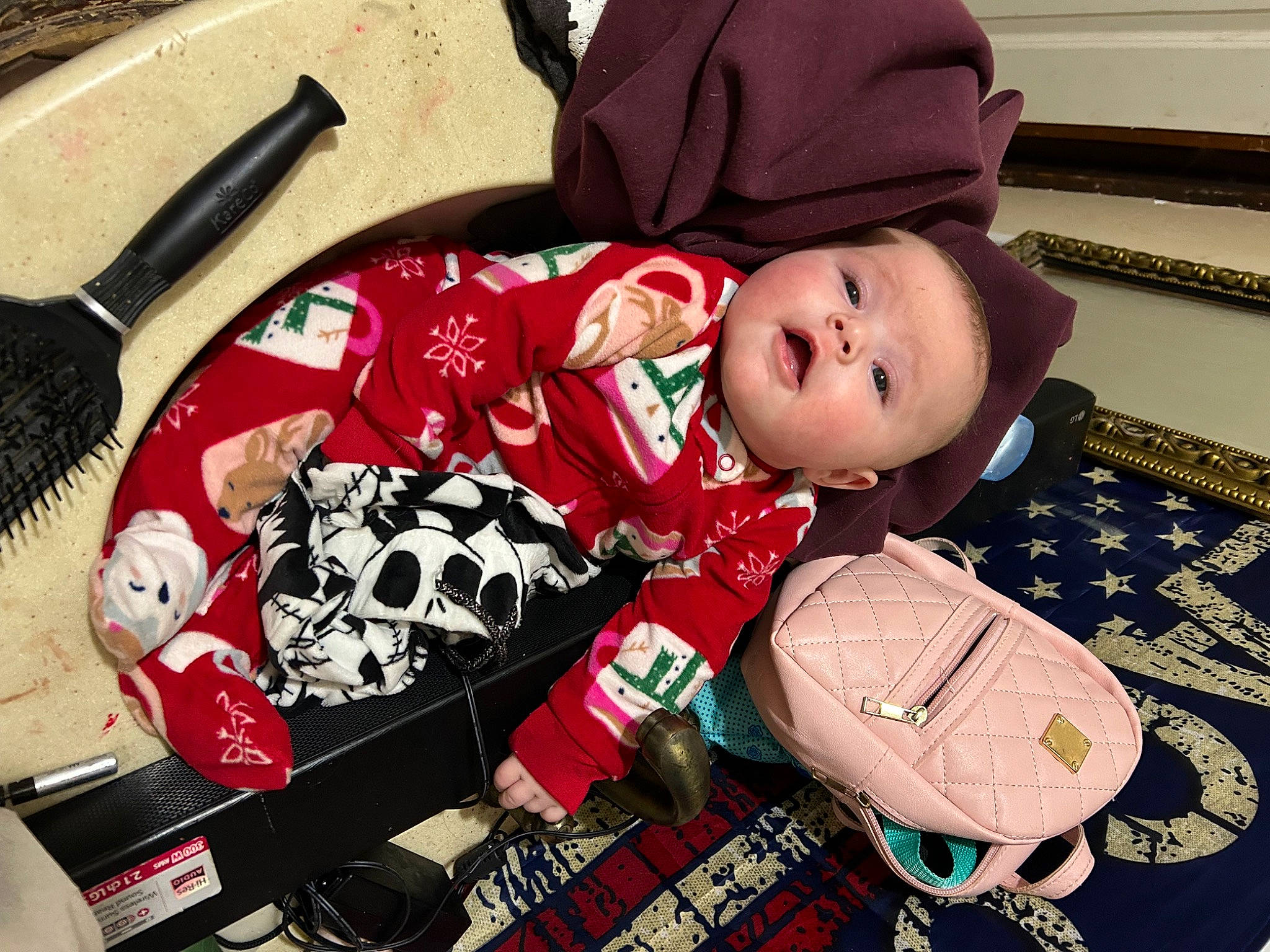 Hazel is registered to the contest to win money with this photo: baby, baby_toddler_clothing, bag, carmine, child, comfort, cutlery, fashion, fashion_accessory, hat, kitchen_utensil, linens, luggage_and_bags, pattern, person, plaid, room, sleeve, textile, toddler