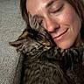 Zelda joined the competition — help win amazing prizes! person, cat, tabby_cat, snuggling, close_up, couch, cozy, sleeping, contentment, fur, face, relaxation, indoor, pet, companion, love, affection, human, animal, comfort