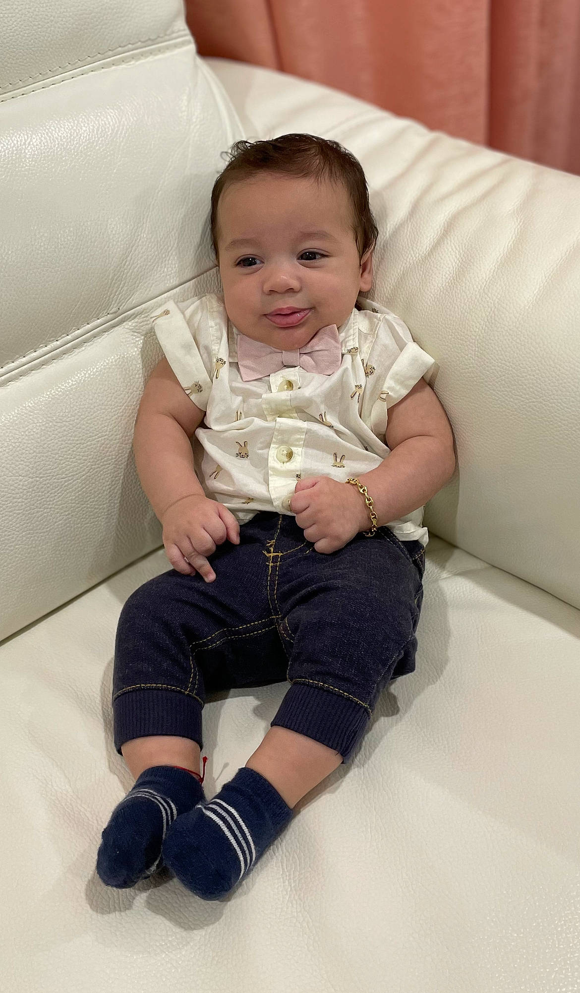 Enzo joined the competition — help win amazing prizes! arm, baby, baby_toddler_clothing, cheek, comfort, couch, elbow, eye, flash_photography, happy, human_leg, knee, person, sitting, skin, sleeve, smile, sock, textile, thigh