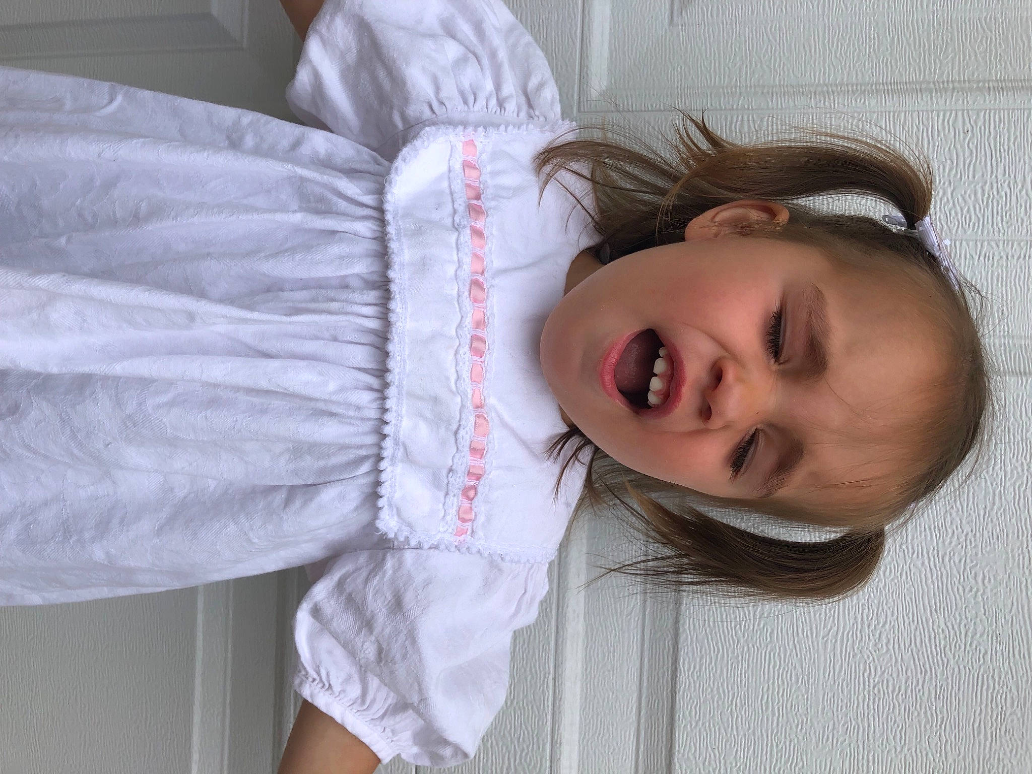 Yesenia joined the competition — help win amazing prizes! brown_hair, child, comfort, eyelash, eyewear, face, fun, happy, joint, linens, lip, mouth, nose, person, portrait_photography, room, selfie, shoulder, sitting, sleeve