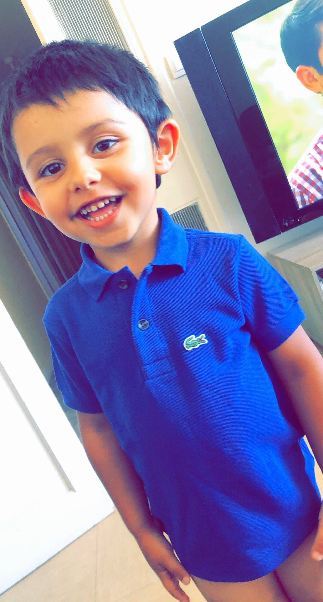 Matheo participe au concours pour gagner de l'argent avec cette photo : blue, child, chin, cool, electric_blue, forehead, fun, happy, joy, leisure, person, play, polo_shirt, recreation, selfie, sleeve, smile, sportswear, t_shirt, toddler