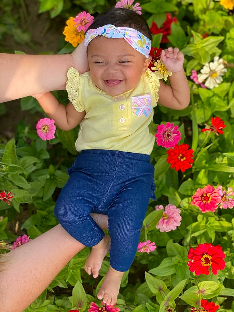 Giavanna joined the competition — help win amazing prizes! child, child_model, flower, grass, happy, headwear, joy, meadow, person, petal, pink, plant, play, spring, toddler, wildflower