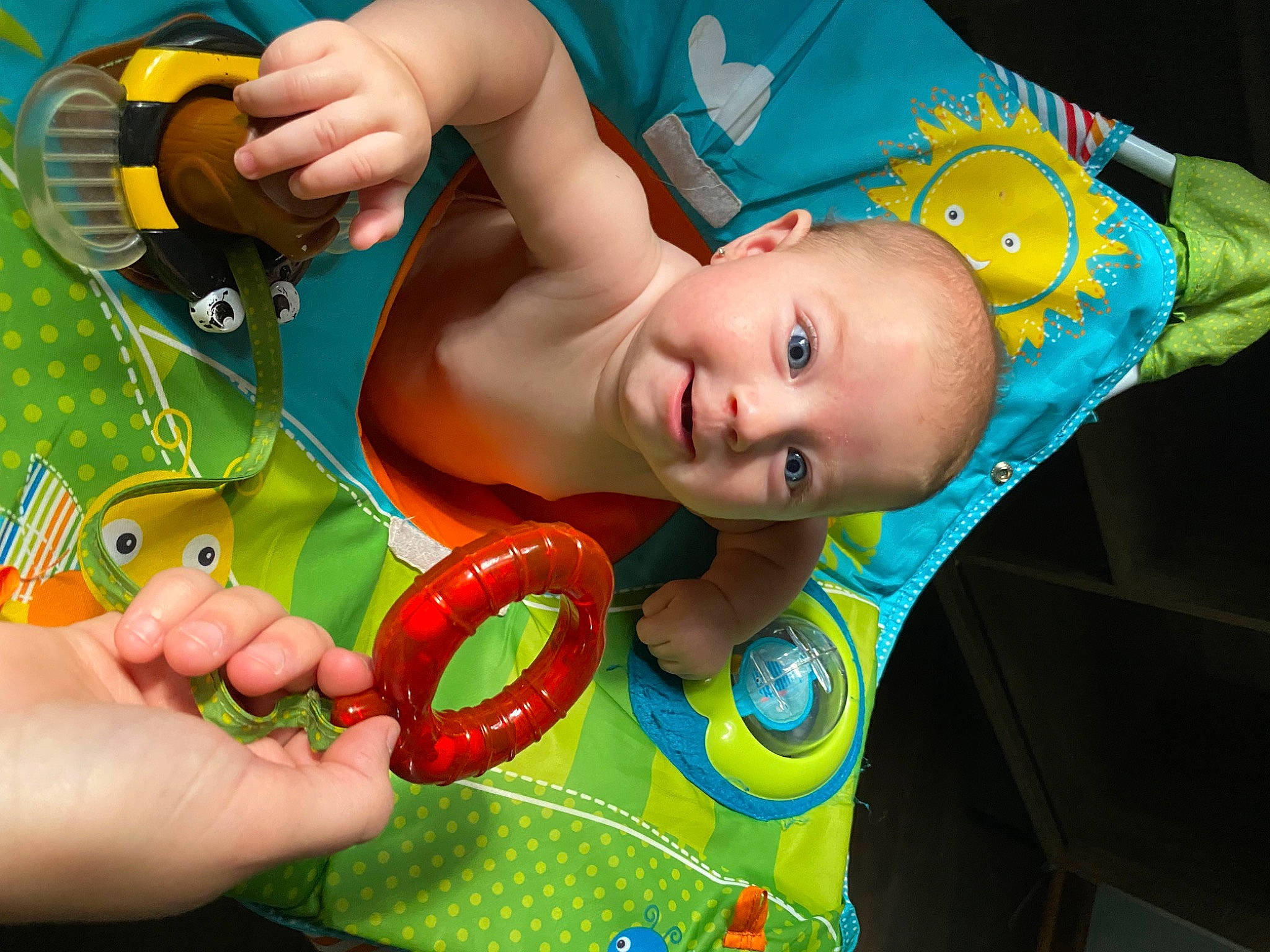 Saylor joined the competition — help win amazing prizes! baby, baby_playing_with_toys, baby_products, baby_toddler_clothing, child, event, finger, fun, green, hand, happy, leisure, mouth, person, play, smile, sweetness, thumb, toddler, toy