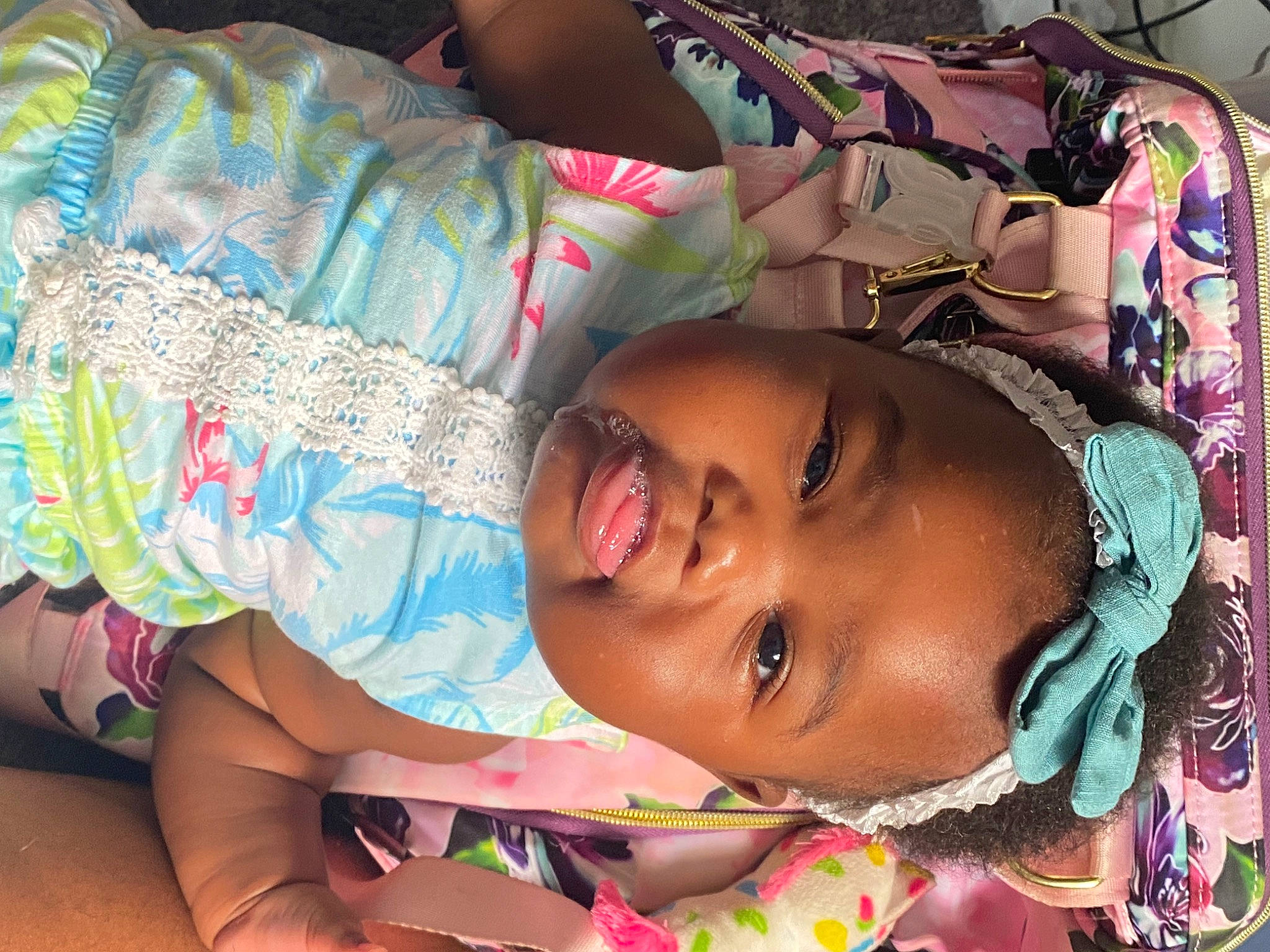 Alyssa is registered to the contest to win money with this photo: adaptation, baby, cheek, child, eyelash, fun, happy, head, mouth, pattern, person, pink, skin, smile, textile, toddler