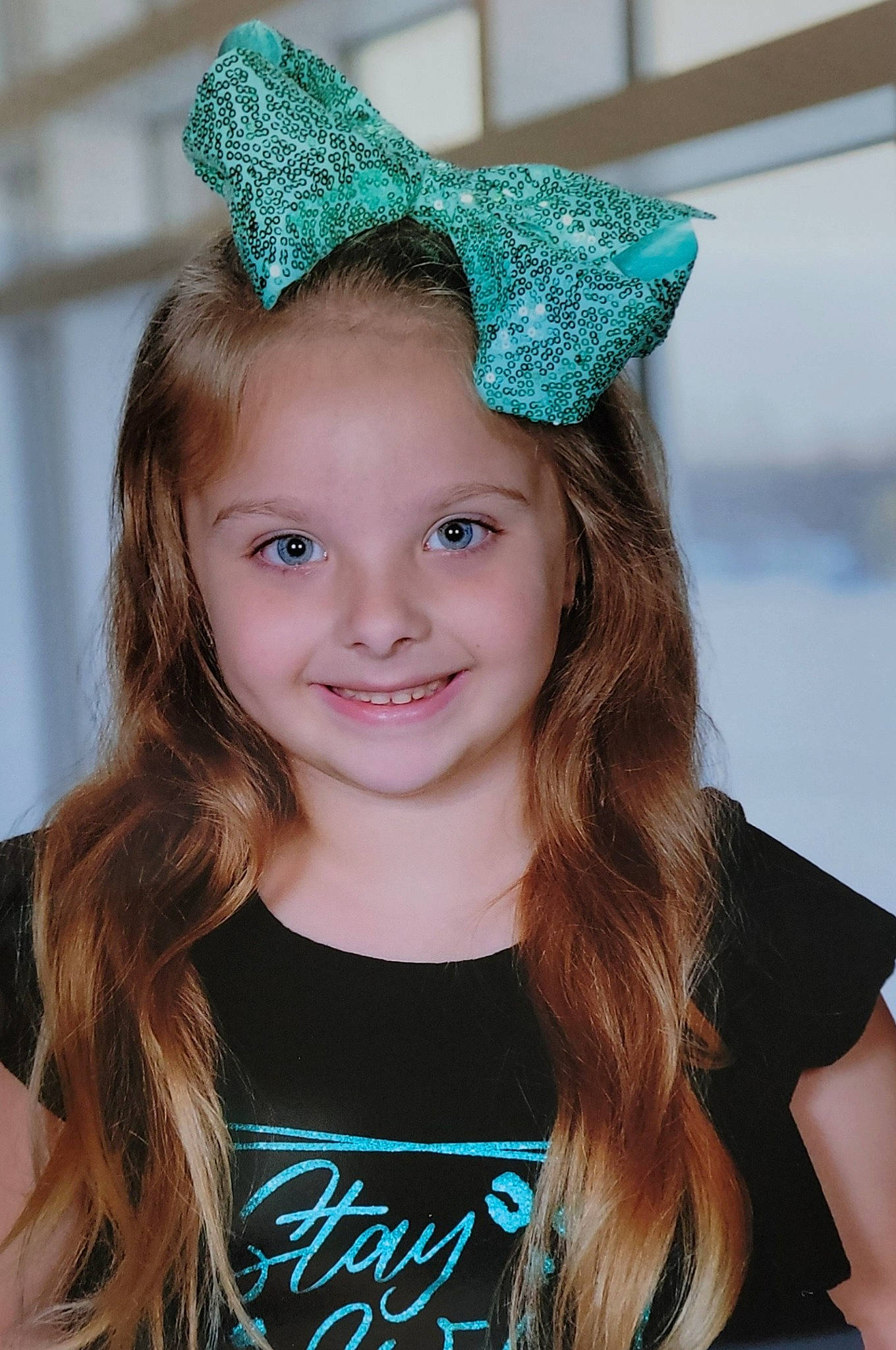 Mackenzie joined the competition — help win amazing prizes! beauty, bridal_accessory, clothing, costume_hat, electric_blue, event, fashion_accessory, fashion_design, fun, green, hair_accessory, happy, headband, headpiece, joy, party_hat, party_supply, pattern, person, smile