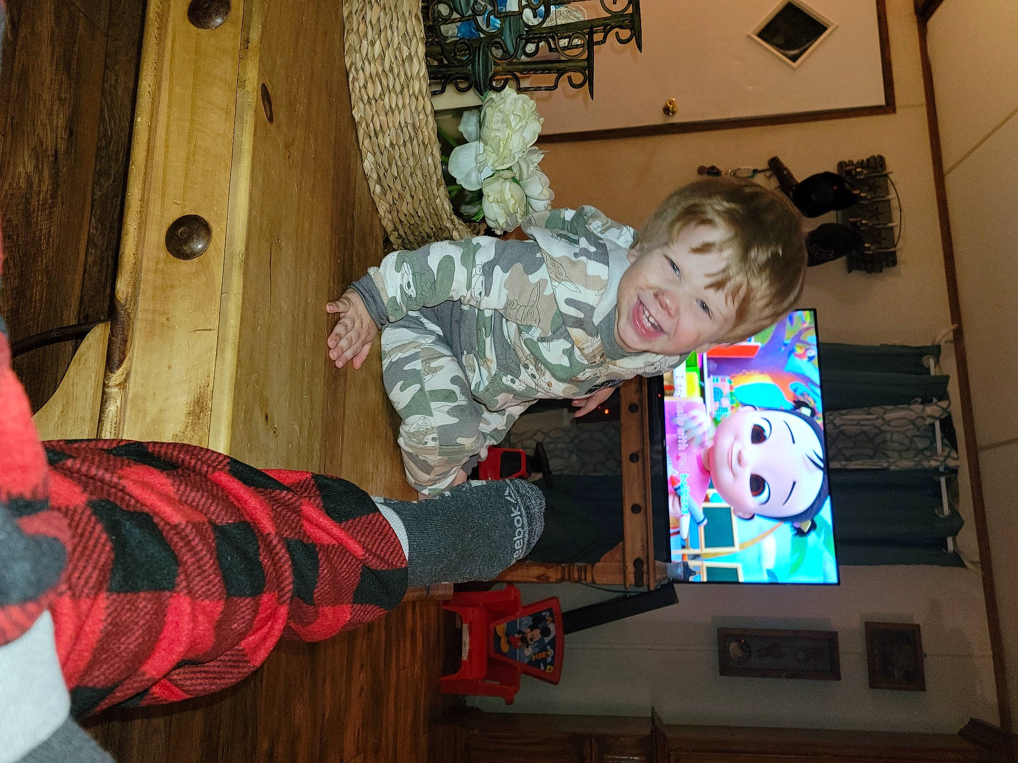 Walker joined the competition — help win amazing prizes! art, baby, baby_toys, child, display_device, flooring, fun, holiday, leisure, pattern, person, plaid, play, room, sitting, tartan, toddler, toy, tree, visual_arts