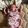 baby, bedroom, blanket, clothing, cute, fabric, indoors, infant, lying_down, mattress, newborn, pacifier, pastel_colors, patterned, peaceful, sleeping, small_feet, small_hands, soft_light, toddler