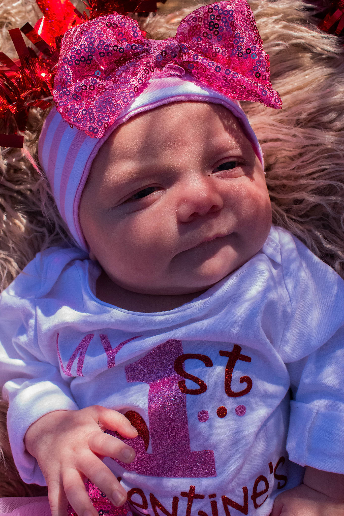 Elianna is registered to the contest to win money with this photo: baby_toddler_clothing, cap, cheek, clothing, cool, eye, eyebrow, face, happy, head, headgear, headwear, human, lip, magenta, mouth, person, pink, red, skin