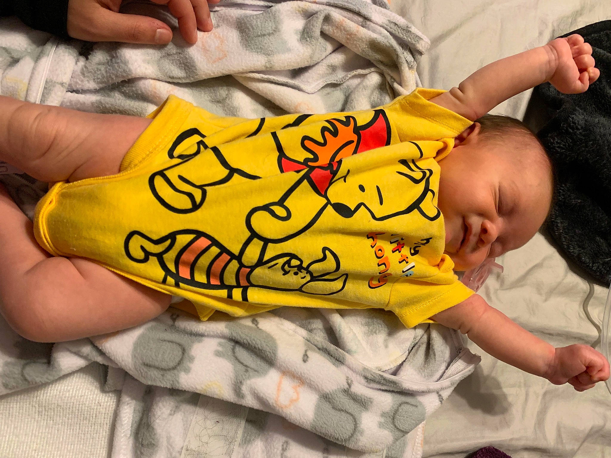 Elianna is registered to the contest to win money with this photo: art, baby, comfort, elbow, finger, font, gesture, happy, human_body, linens, nail, pattern, person, sleeve, t_shirt, textile, thigh, thumb, toddler, wrist