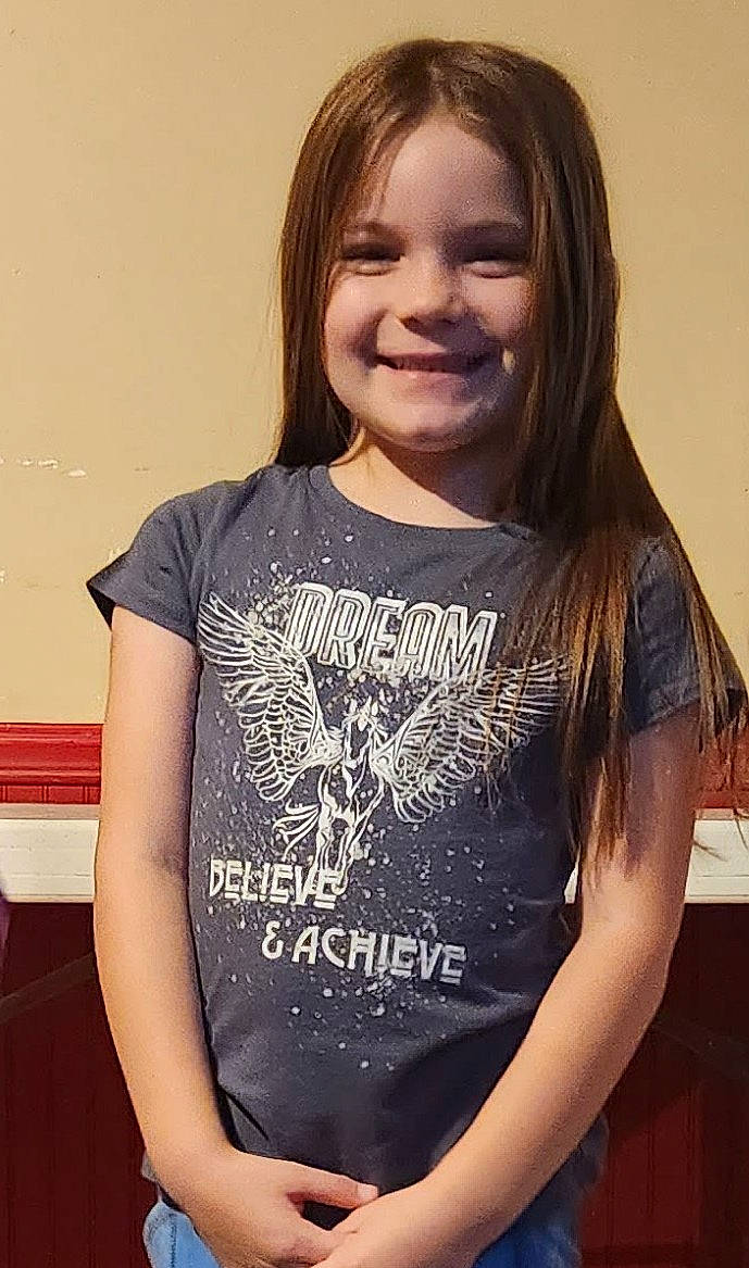 Timberlyn joined the competition — help win amazing prizes! active_shirt, arm, cheek, flash_photography, fun, hairstyle, happy, iris, joy, laugh, layered_hair, neck, pattern, person, portrait_photography, shoulder, sitting, sleeve, smile, t_shirt