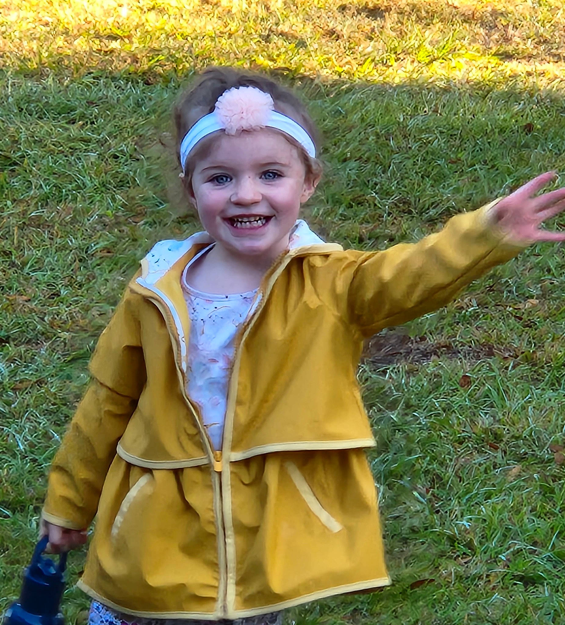 Dannie is registered to the contest to win money with this photo: cap, child, costume, costume_hat, fun, gesture, grass, grassland, happy, headwear, joy, laugh, leaf, people_in_nature, person, plant, sleeve, smile, soil, spring