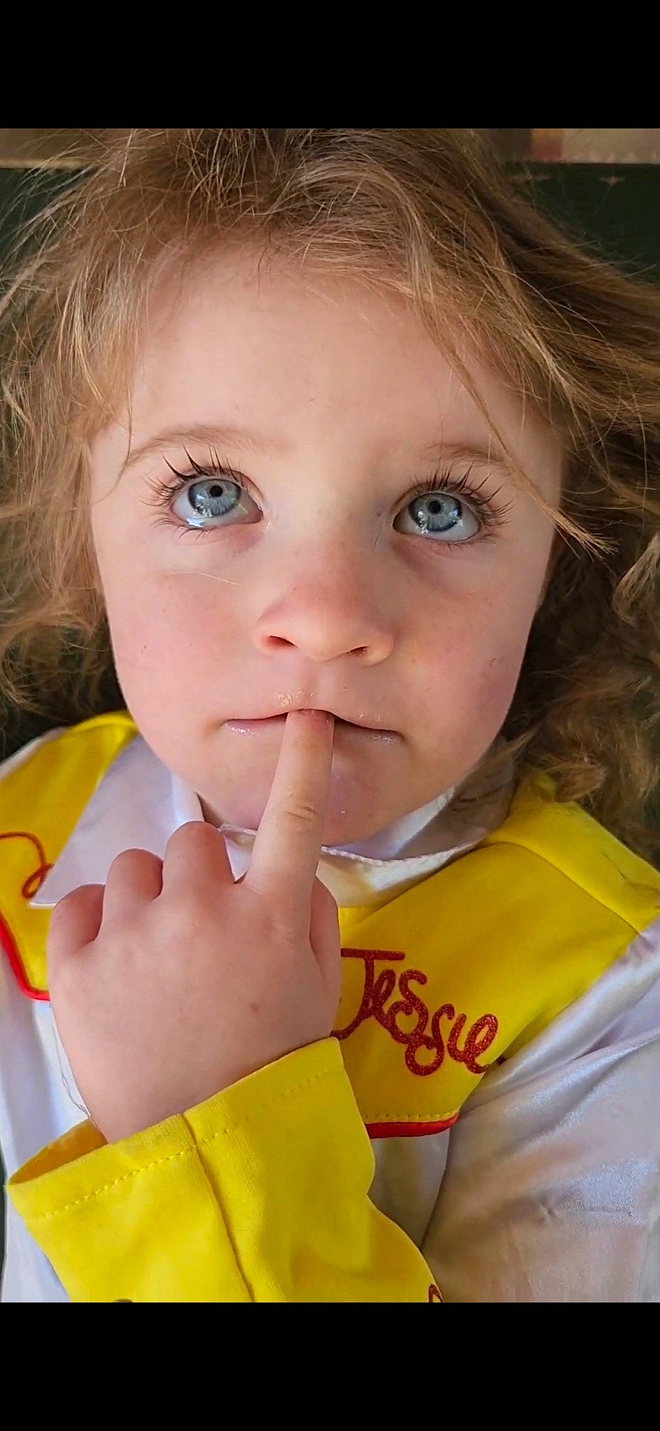 Dannie is registered to the contest to win money with this photo: cheek, chin, ear, eye, eyebrow, eyelash, face, finger, gesture, hair, hairstyle, hand, happy, head, iris, lip, mouth, nose, person, skin