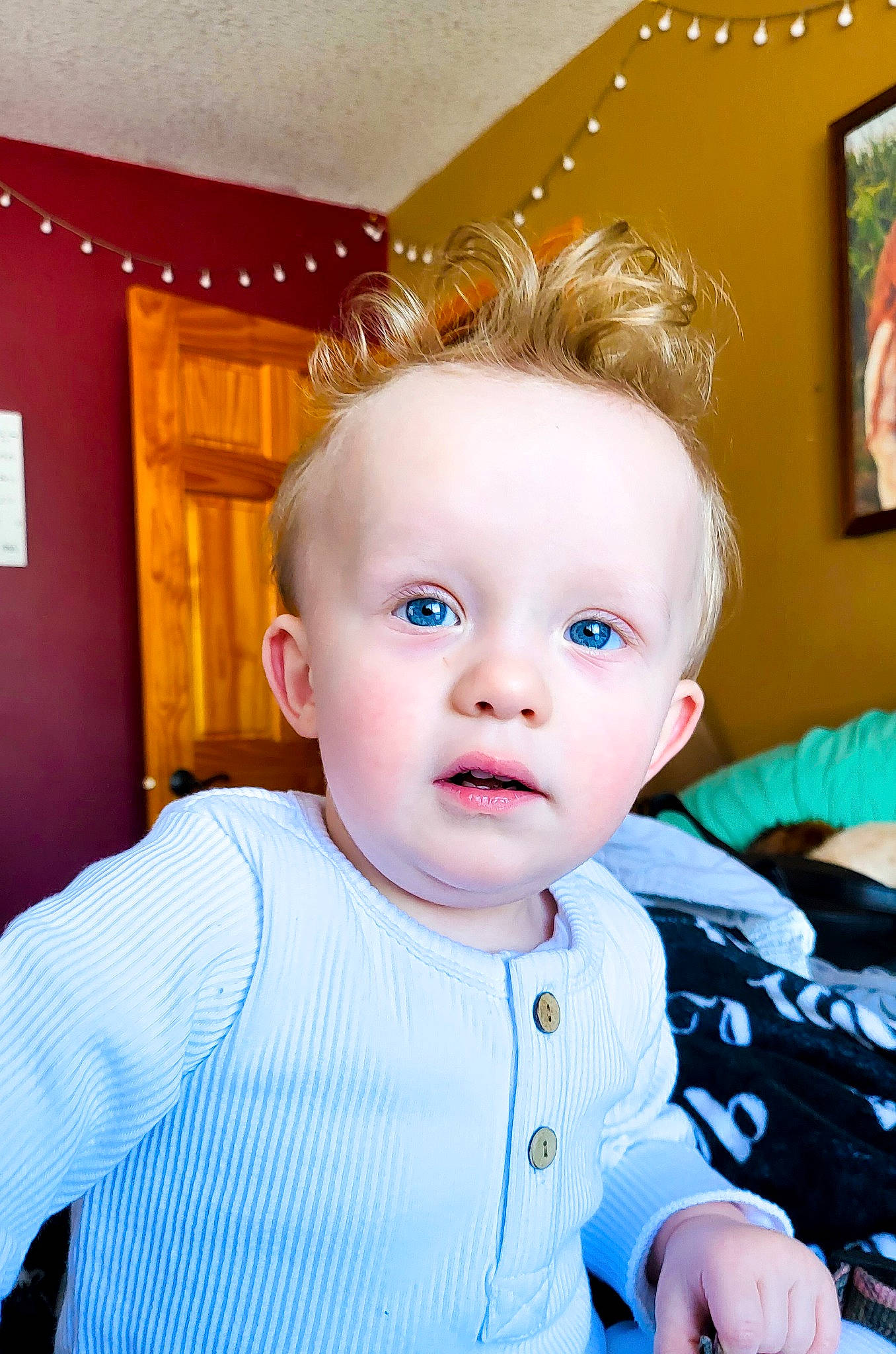 Finnley is registered to the contest to win money with this photo: baby, baby_toddler_clothing, cheek, child, chin, door, electric_blue, eyelash, fun, happy, iris, person, picture_frame, portrait_photography, room, sitting, skin, sleeve, t_shirt, toddler