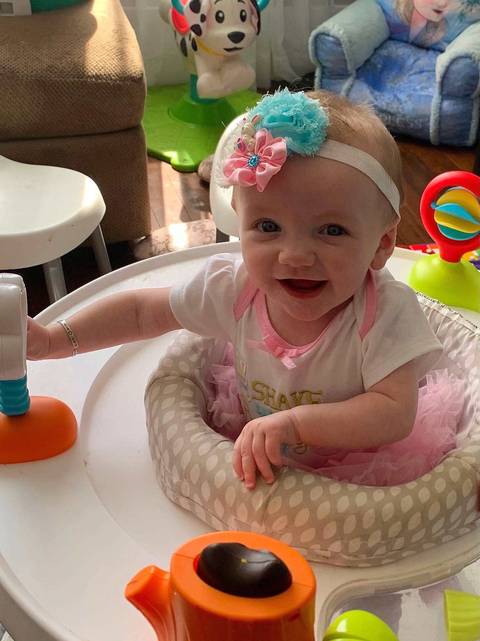Lillian is registered to the contest to win money with this photo: baby, baby_laughing, baby_toddler_clothing, cap, coffee_cup, cup, drinkware, fun, green, happy, headwear, joy, leisure, person, pink, serveware, skin, smile, snapshot, table