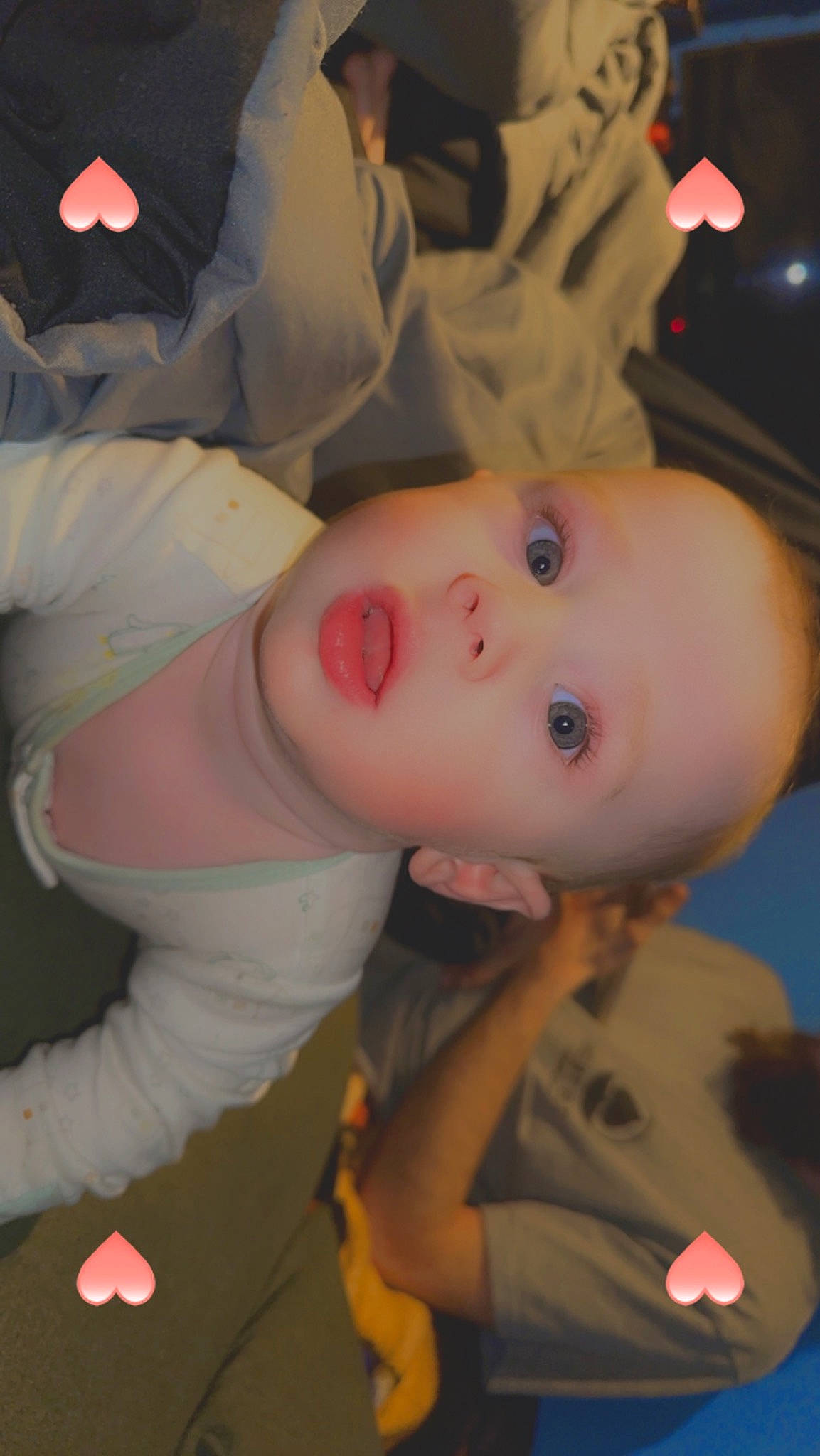 Kamron is registered to the contest to win money with this photo: arm, baby, baby_products, baby_toddler_clothing, cheek, child, comfort, fun, happy, iris, lip, mouth, nose, person, room, sitting, skin, sleeve, surprise, toddler