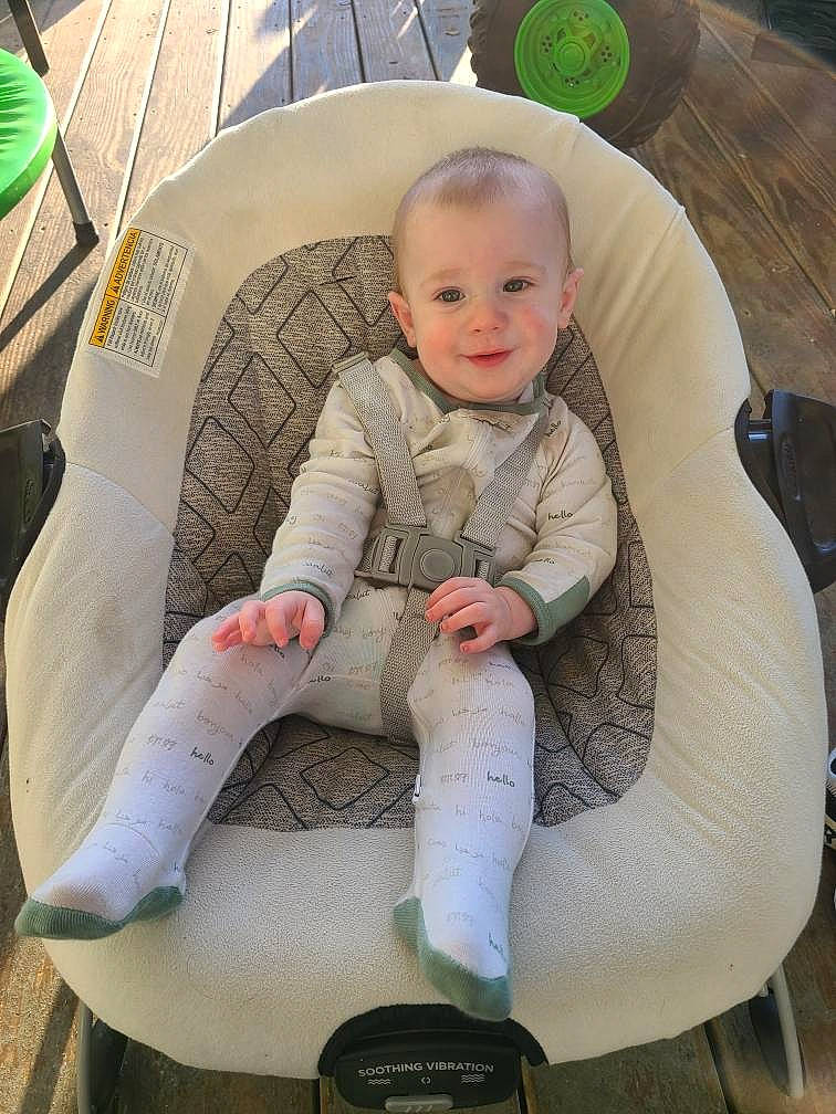 Kamron joined the competition — help win amazing prizes! automotive_wheel_system, baby, baby_carriage, baby_products, baby_toddler_clothing, car_seat, chair, child, comfort, fun, grass, joy, knee, lap, leisure, person, recreation, sitting, smile, steering_wheel