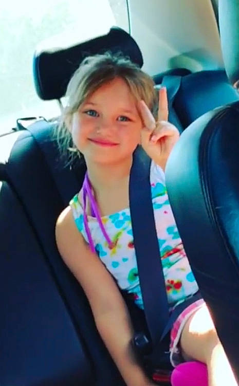 Lillyanna is registered to the contest to win money with this photo: auto_part, automotive_design, black_hair, car_seat, car_seat_cover, child, comfort, electric_blue, fun, happy, head_restraint, joy, leisure, luxury_vehicle, motor_vehicle, person, recreation, sitting, smile, steering_wheel