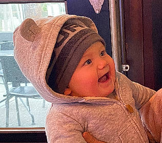 Syrus Jo joined the competition — help win amazing prizes! baby, baby_toddler_clothing, cap, cheek, child, chin, comfort, eye, fashion_accessory, fun, happy, head, headwear, lip, mouth, nose, outerwear, person, skin, sleeve