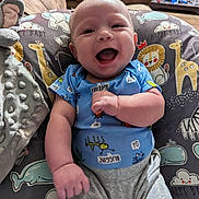 Elijah joined the competition — help win amazing prizes! baby, babylaughing, bodypart, clothing, couch, cushion, face, finger, furniture, hand, happy, head, homedecor, laughing, pants, person, photography, portrait, sitting, t_shirt
