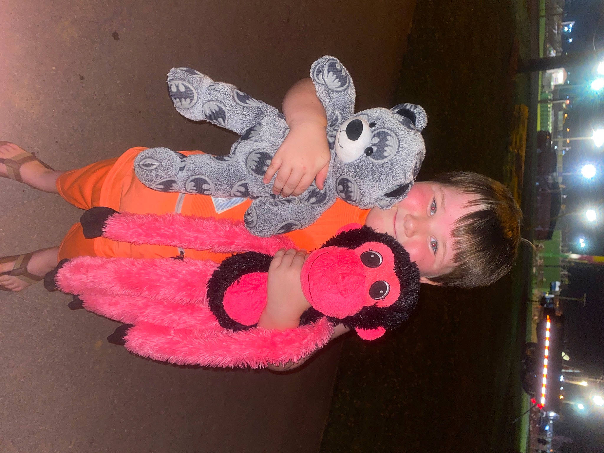 Sawyer is registered to the contest to win money with this photo: baby_products, baby_toddler_clothing, baby_toys, carmine, child, costume, event, flooring, fun, joy, magenta, pattern, person, pink, plush, room, stuffed_toy, textile, toddler, toy