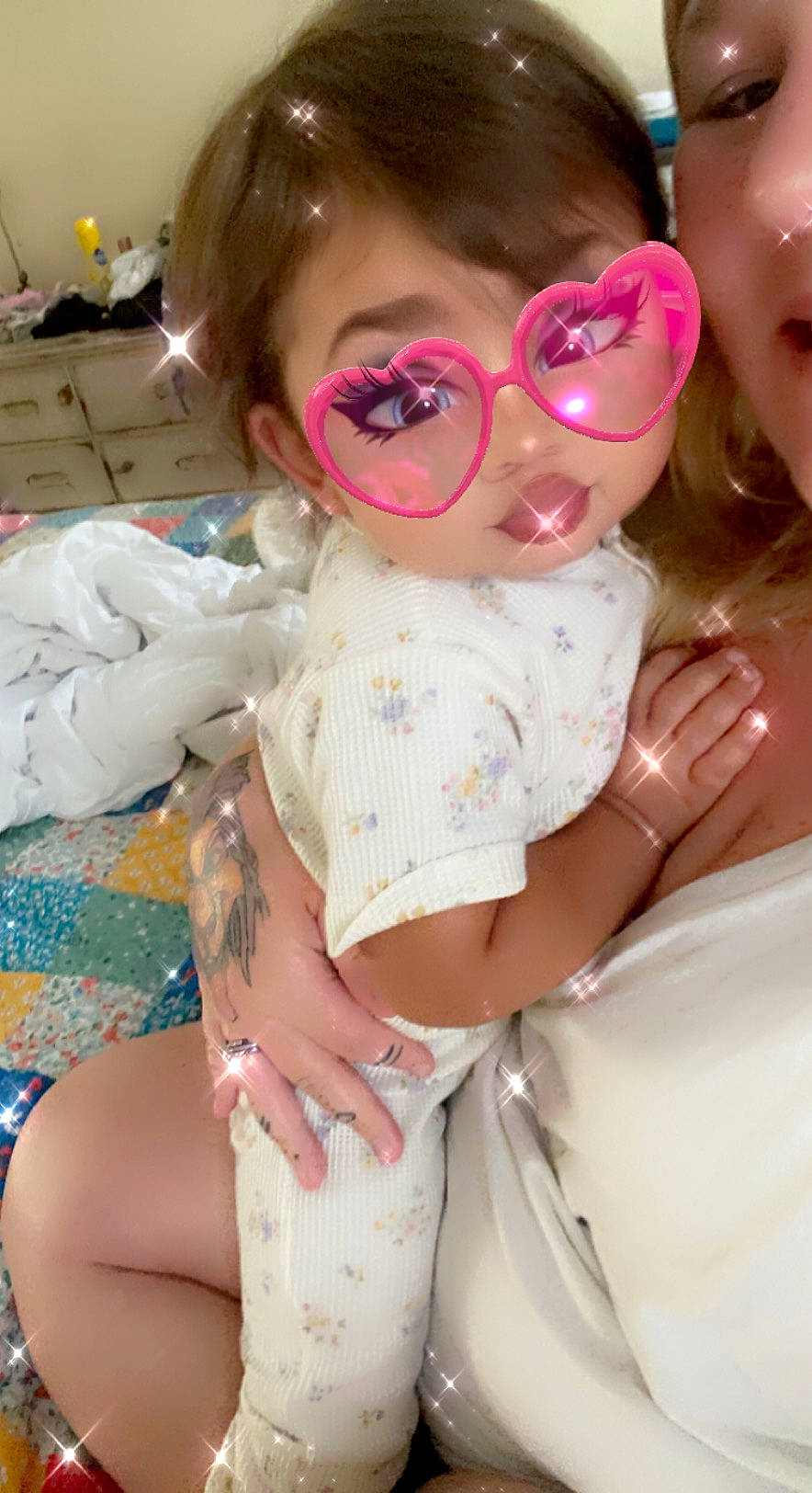 Houston is registered to the contest to win money with this photo: baby_toddler_clothing, cheek, child, eye_glass_accessory, eyelash, eyewear, gesture, goggles, hand, happy, head, lip, mouth, nose, person, pink, skin, sleeve, sunglasses, toddler