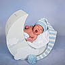 newborn, baby, yawning, blue_hat, striped_hat, pom_pom, crescent_moon, prop, blanket, soft_texture, studio_photo, infant, sleepy, cute, resting, baby_pose, blue_background, child, portrait, cozy