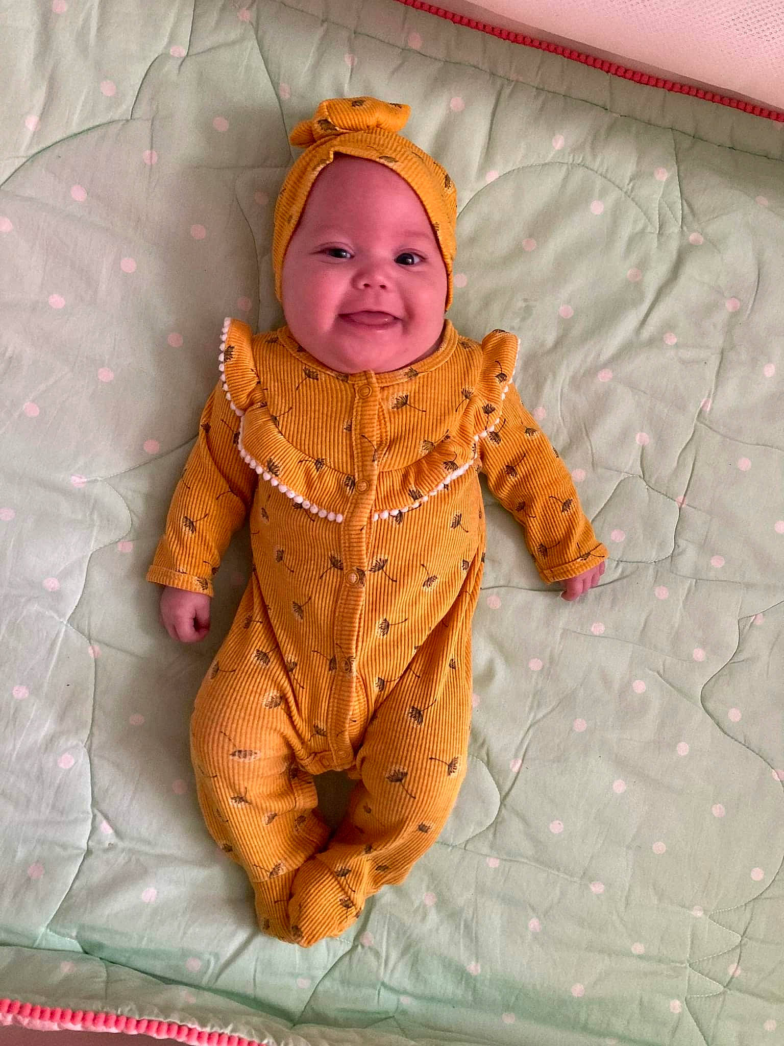 Marilynn is registered to the contest to win money with this photo: baby, baby_toddler_clothing, cheek, child, comfort, eye, face, fur, happy, head, headgear, headwear, jacket, joy, linens, nose, orange, peach, person, sleeve