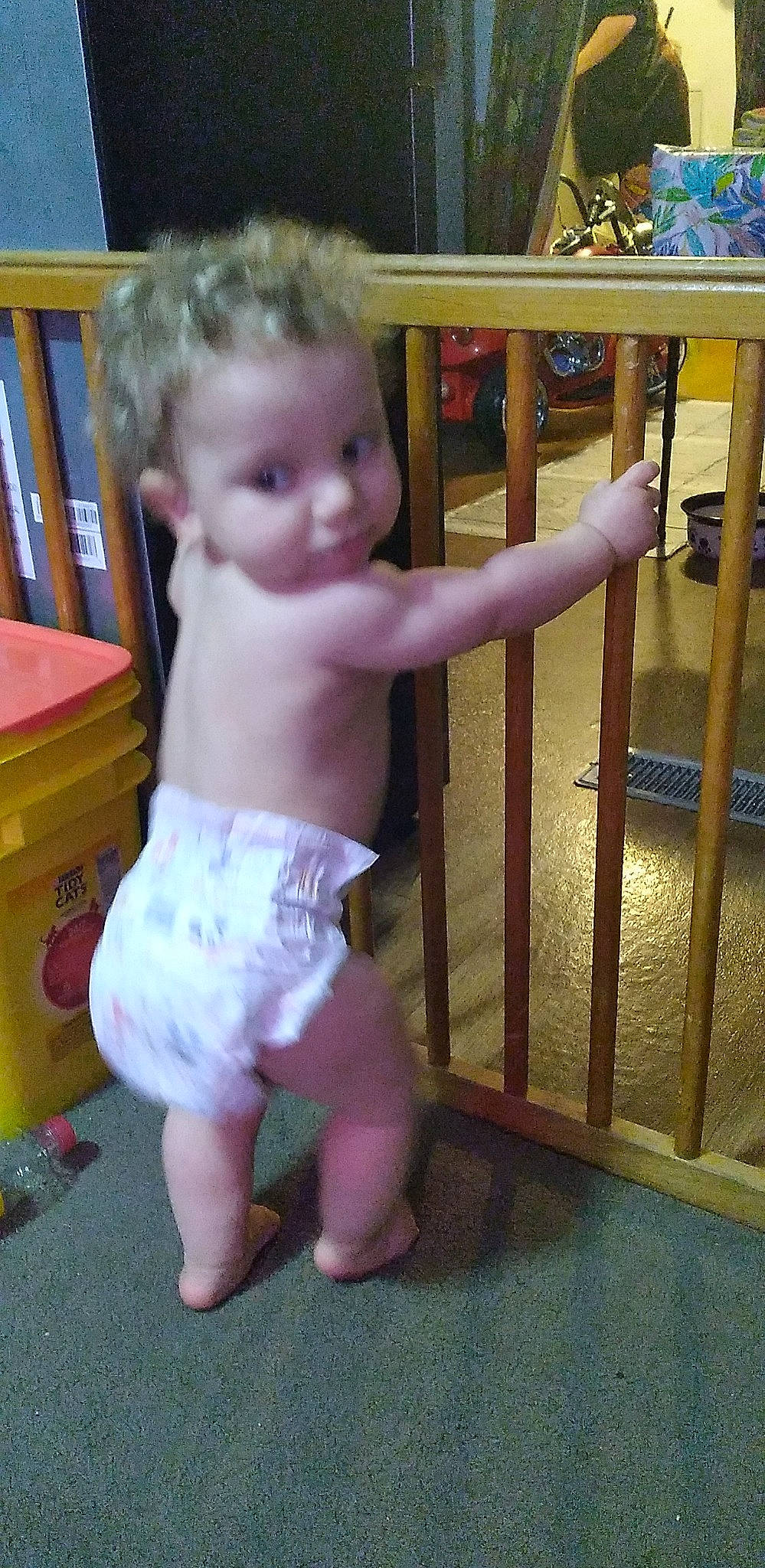 Jericho is registered to the contest to win money with this photo: baby, baby_toddler_clothing, cheek, chest, diaper, finger, floor, flooring, fun, iris, joint, organ, person, product, skin, standing, table, thumb, toddler, trunk