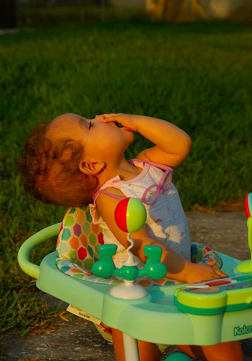 Nevaeh joined the competition — help win amazing prizes! baby, baby_playing_with_toys, baby_products, baby_toddler_clothing, chair, child, fun, garden, grass, happy, leisure, outdoor_furniture, person, play, recreation, sitting, smile, table, thigh, toddler