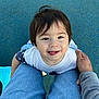toddler, child, smiling, tongue_out, jeans, hand, blue_floor, playground, casual_clothing, portrait, happy, cute, outdoor, person, looking_up, short_hair, skin, holding, casual, daylight