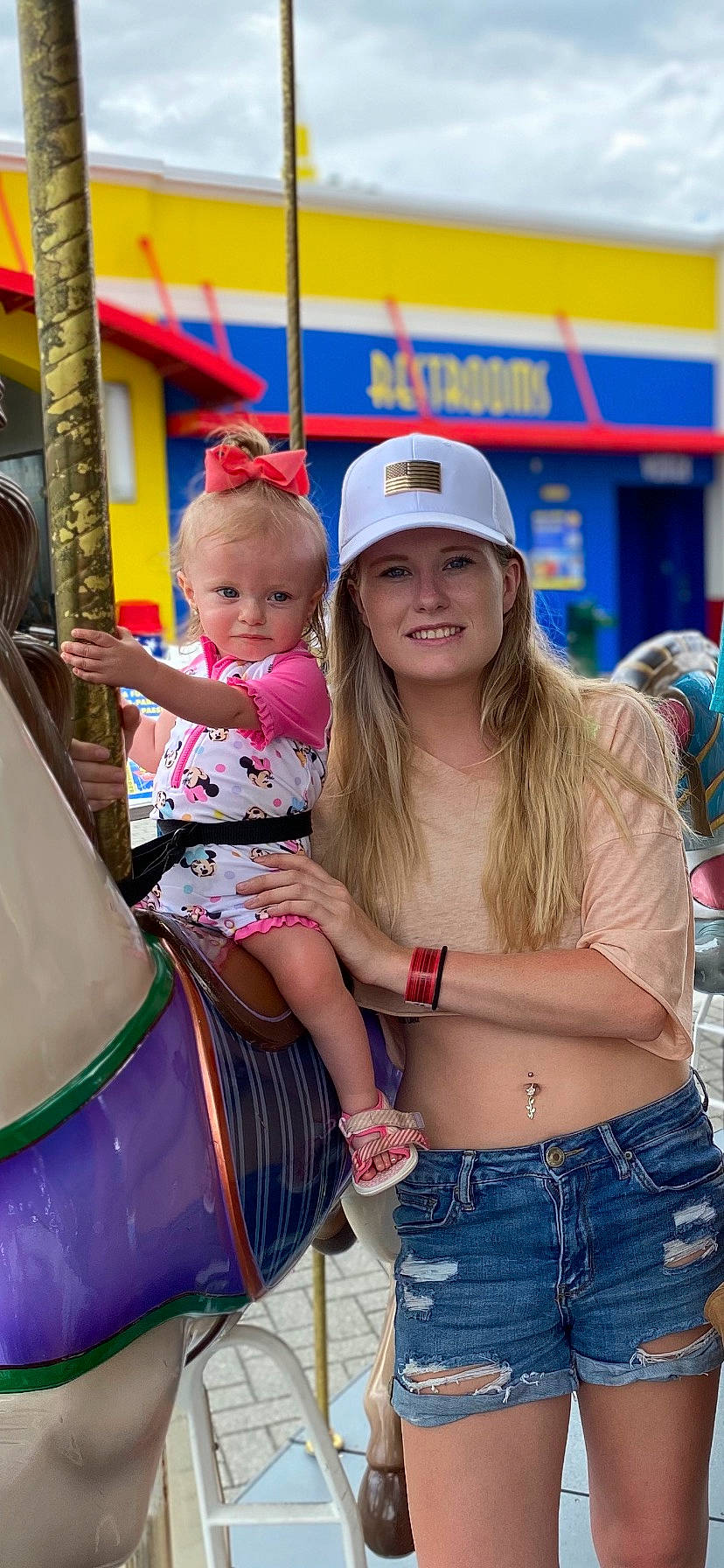 Dakota is registered to the contest to win money with this photo: belt, blue, electric_blue, facial_expression, fun, happy, headwear, human_leg, jean_short, joy, leisure, people, person, photograph, recreation, snapshot, summer, t_shirt, thigh, toddler