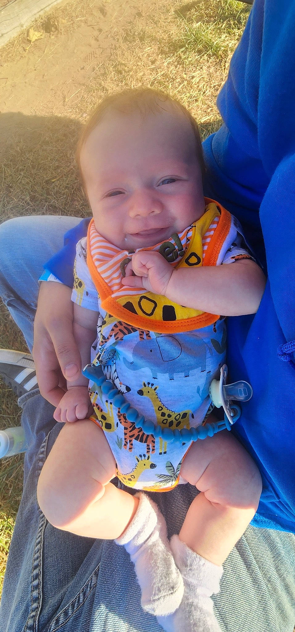 Oliver joined the competition — help win amazing prizes! baby, baby_toddler_clothing, blue, cheek, child, electric_blue, eye, finger, grass, happy, head, leg, mouth, nail, orange, person, skin, sleeve, summer, thigh