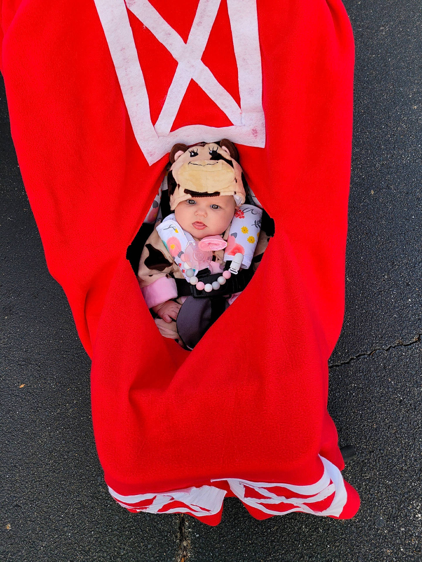 Raelynn joined the competition — help win amazing prizes! baby, baby_carriage, baby_products, baby_sleeping, baby_toddler_clothing, banner, carmine, child, costume_hat, event, fashion_accessory, fictional_character, flag, font, gesture, headwear, linens, outerwear, person, santa_claus