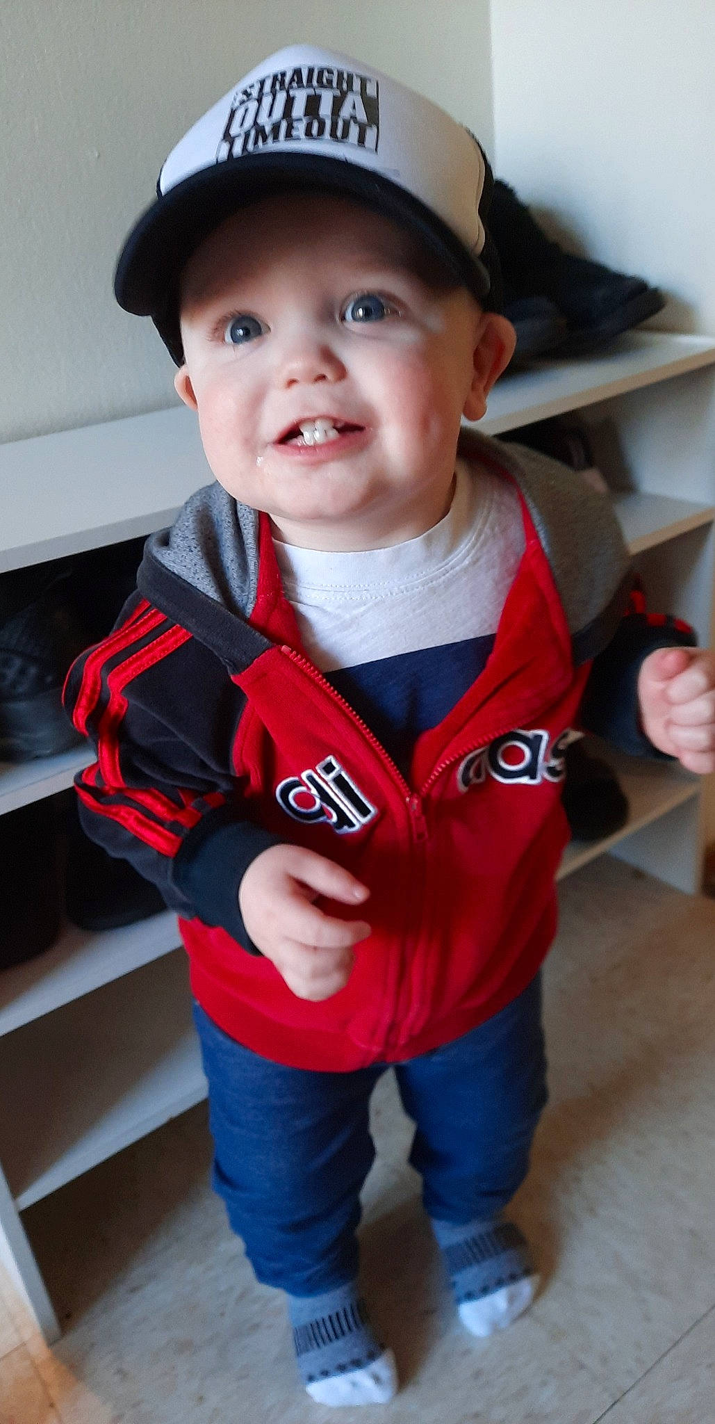 Dallas is registered to the contest to win money with this photo: baby, baby_toddler_clothing, cap, carmine, child, chin, electric_blue, happy, hat, headwear, jeans, joy, mouth, person, skin, sleeve, smile, sun_hat, t_shirt, thumb