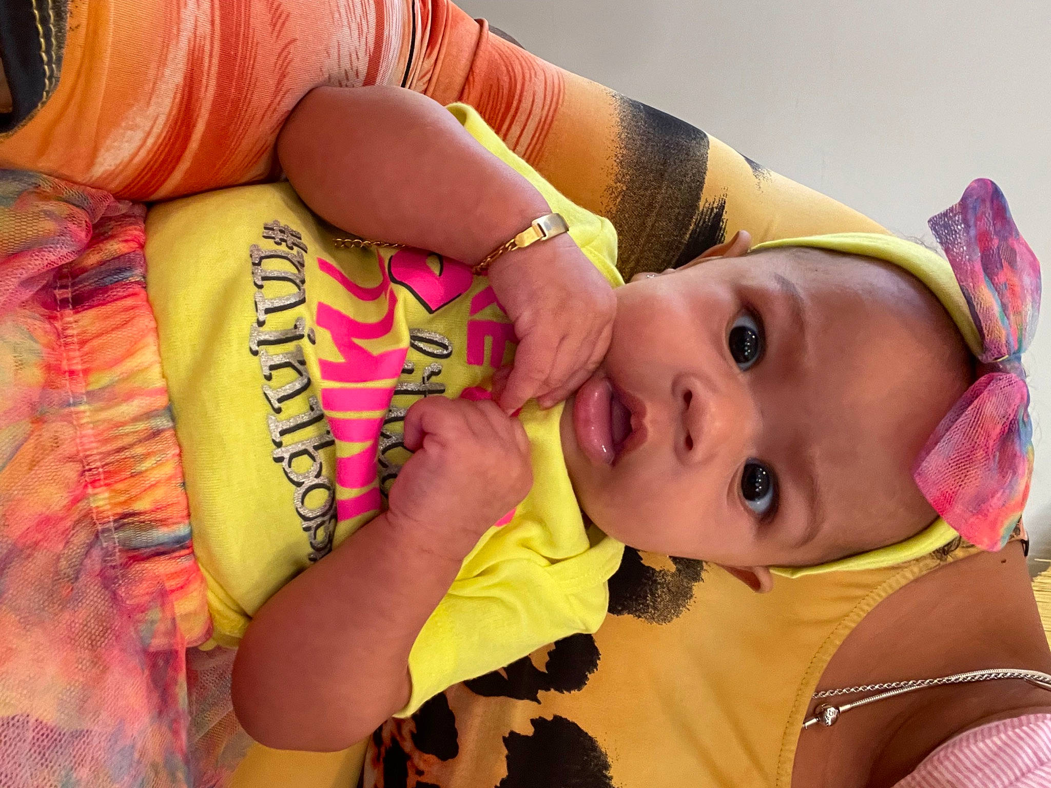 Surae is registered to the contest to win money with this photo: baby_toddler_clothing, cheek, eye, eyelash, finger, hairstyle, happy, headgear, human, human_body, lip, mouth, neck, nose, person, pink, skin, surprise, temporary_tattoo, textile