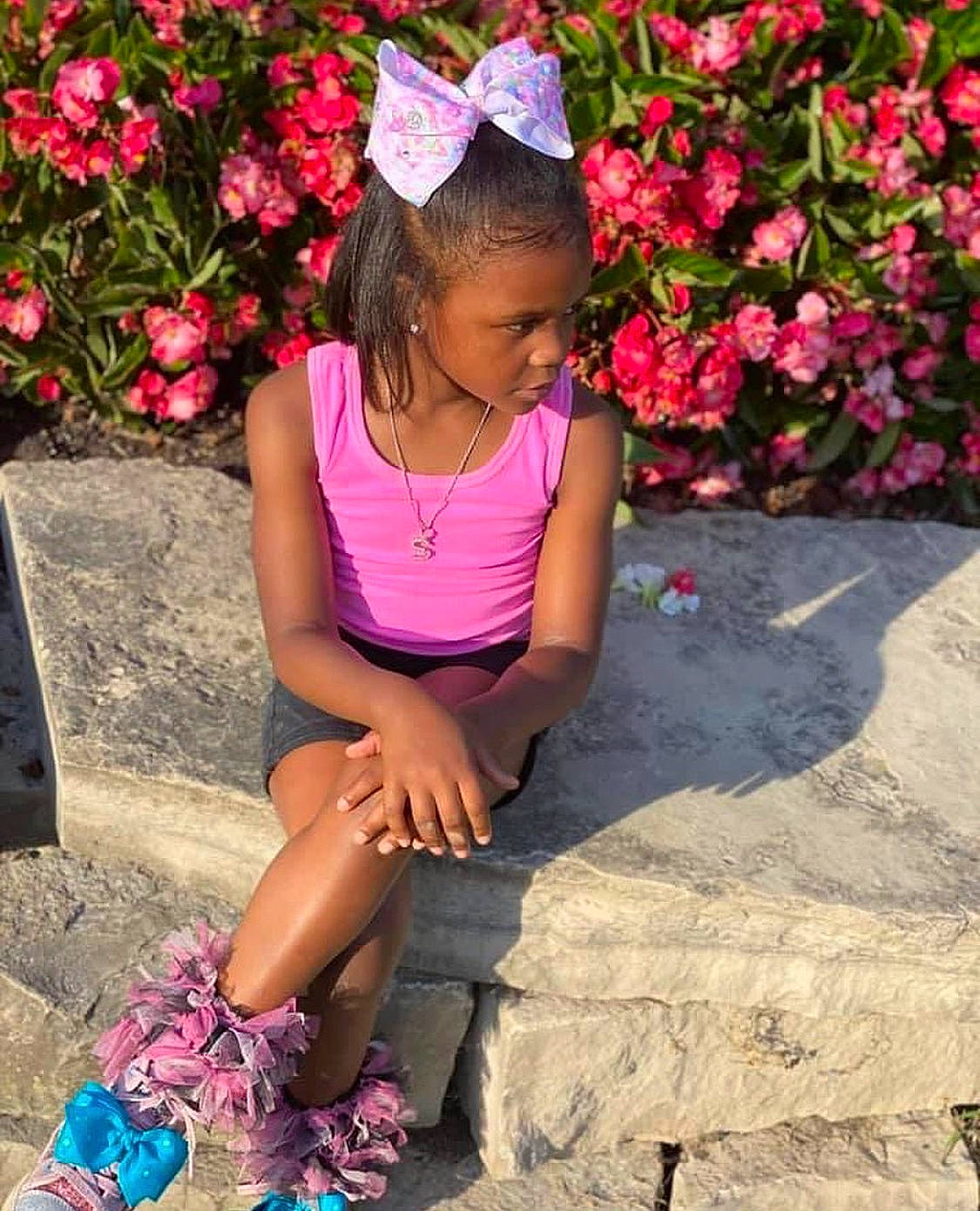 Skylar joined the competition — help win amazing prizes! botany, flower, grass, happy, leaf, leg, leisure, magenta, morning, people, people_in_nature, person, petal, pink, plant, red, smile, sneakers, summer, t_shirt