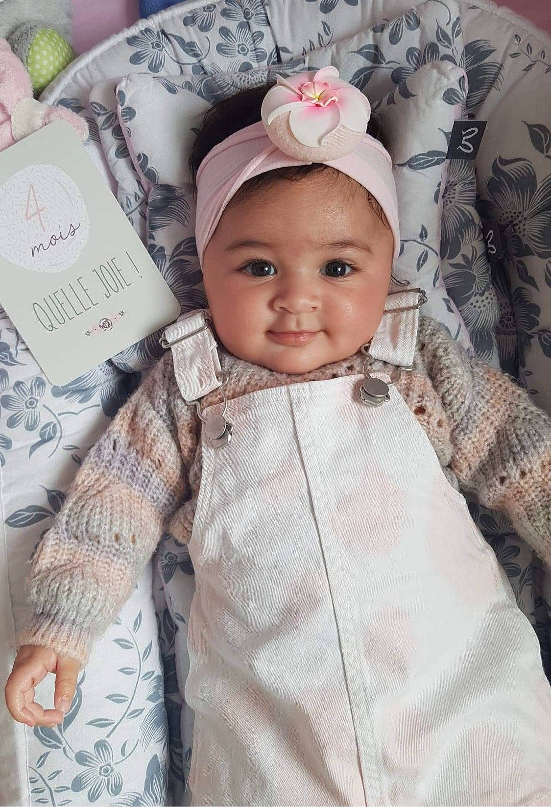 Hoani a rejoint le concours — aidez-le/la à gagner de superbes lots ! baby, baby_toddler_clothing, cap, cheek, child, clothing, eye, eyelash, face, happy, headgear, headwear, iris, linens, outerwear, person, pink, sleeve, smile, t_shirt