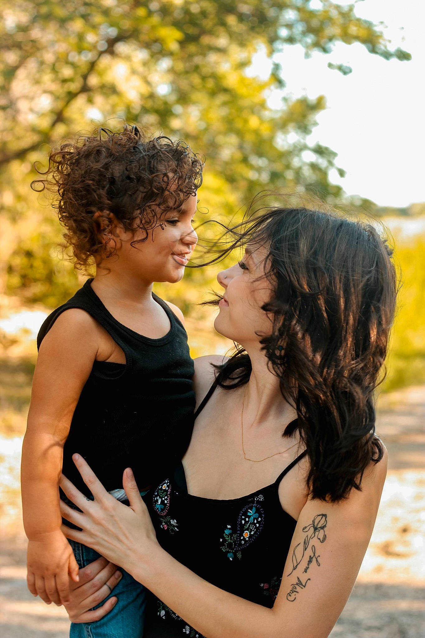 Kenzo is registered to the contest to win money with this photo: abdomen, arm, event, flash_photography, fun, gesture, grass, happy, human_body, joy, leisure, long_hair, people_in_nature, person, photograph, shoulder, smile, summer, sunlight, tree