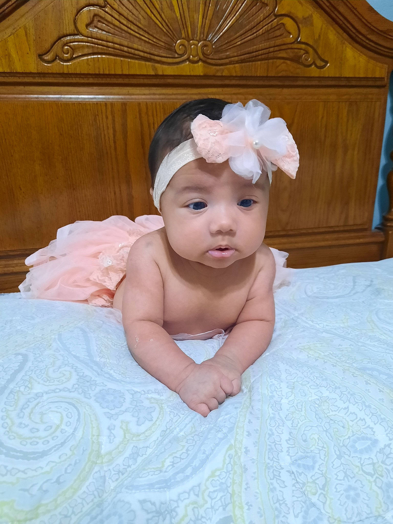 Alyanna is registered to the contest to win money with this photo: baby, baby_products, baby_sleeping, baby_toddler_clothing, cap, cheek, child, chin, fashion_accessory, flower, hair_accessory, headband, headgear, headpiece, headwear, iris, linens, person, pink, sitting