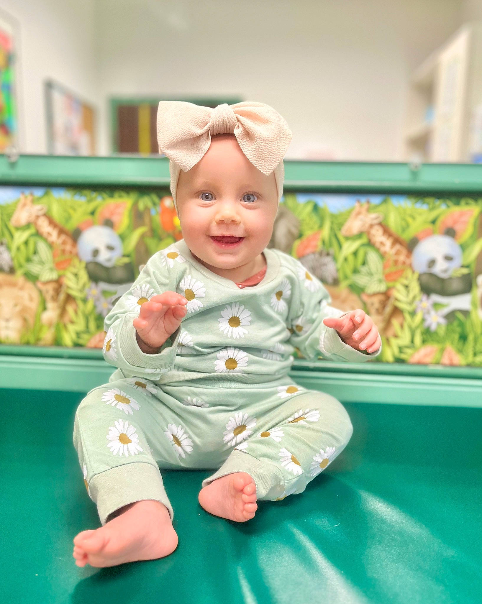 Maevyn is registered to the contest to win money with this photo: baby, baby_products, baby_toddler_clothing, baby_toys, cheek, child, foot, fun, happy, headwear, joy, leisure, person, pink, play, portrait_photography, room, sitting, skin, sleeve