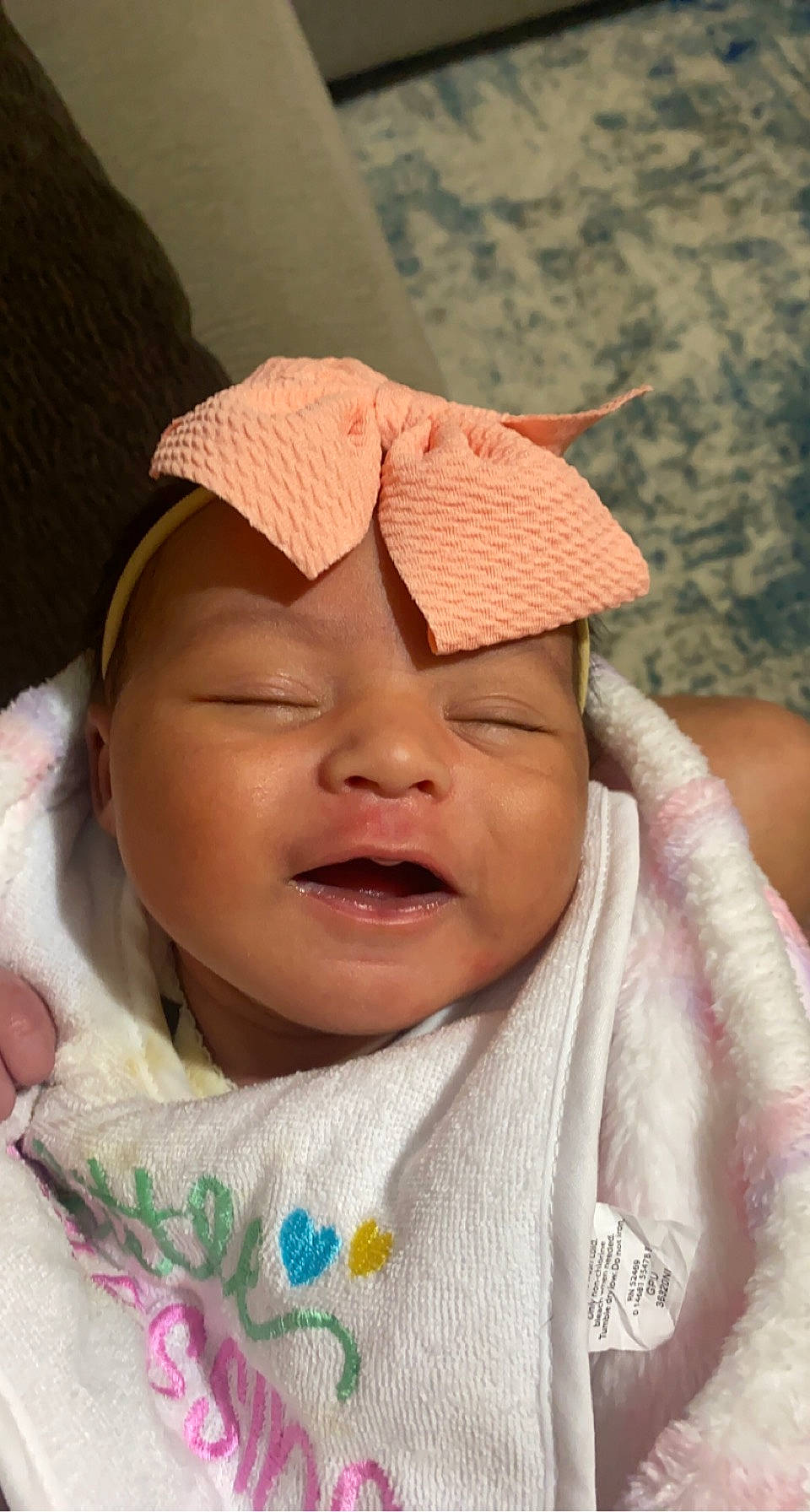 Ava is registered to the contest to win money with this photo: cap, cheek, chin, eye, eyebrow, face, forehead, gesture, happy, head, headwear, human_body, lip, mouth, neck, nose, person, pink, skin, smile