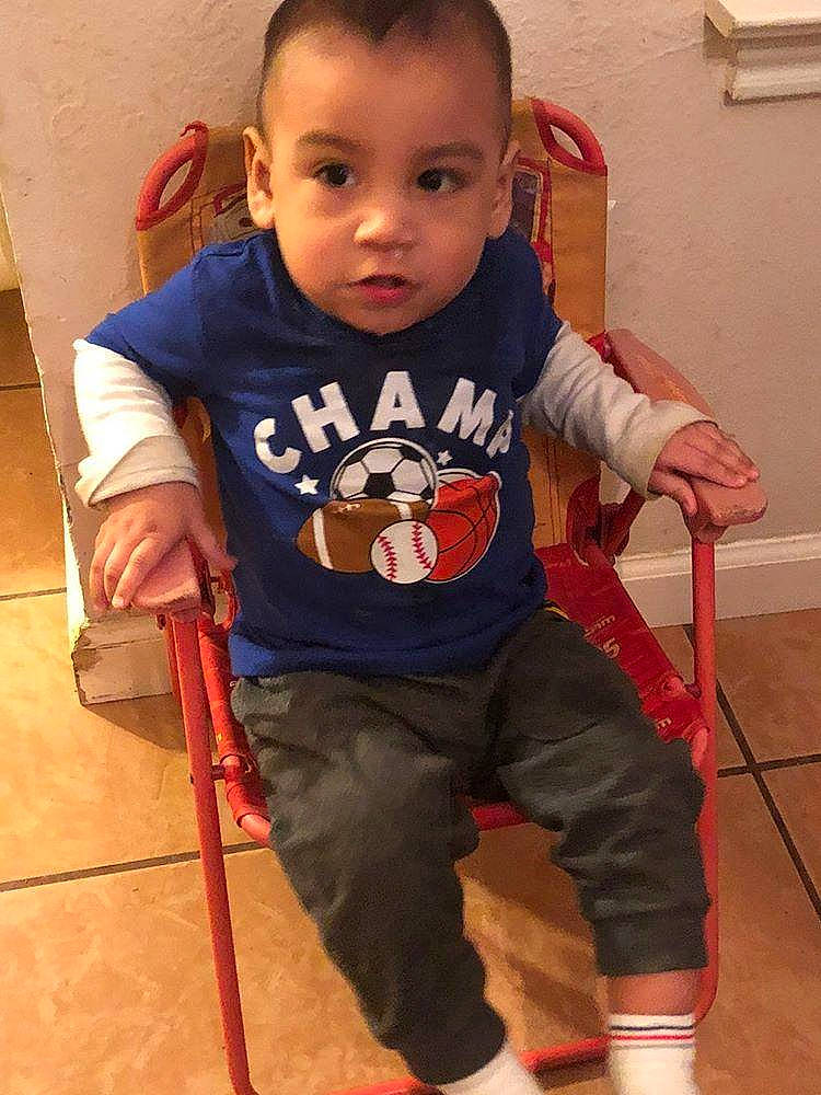 Gilberto joined the competition — help win amazing prizes! baby, baby_toddler_clothing, balance, cheek, child, cool, floor, human_leg, joint, knee, outdoor_shoe, person, play, product, shoe, shoulder, sitting, sneakers, standing, t_shirt