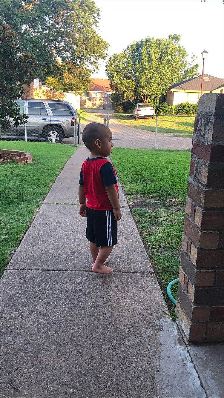 Gilberto joined the competition — help win amazing prizes! baby, backyard, brick, brickwork, child, concrete, driveway, person, residential_area, toddler, truck, vehicle_door, yard