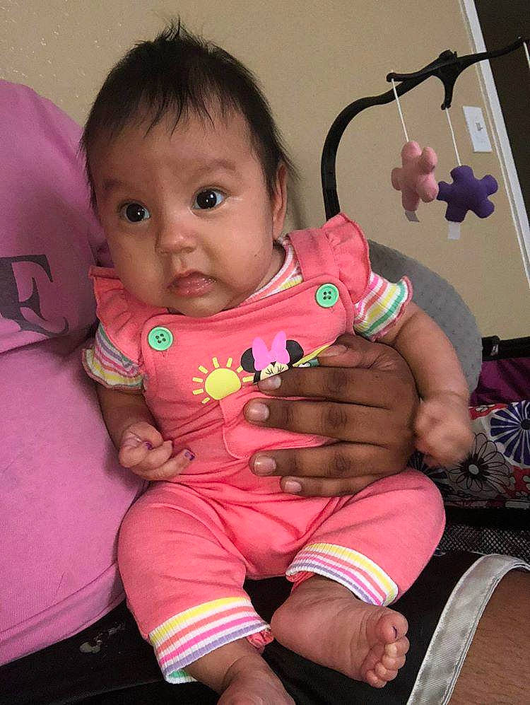 Amara is registered to the contest to win money with this photo: baby, baby_products, baby_toddler_clothing, baby_toys, cheek, child, eye, finger, foot, hand, lap, mechanical_fan, nail, person, pink, product, skin, sock, surprise, thumb