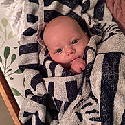 Toby joined the competition — help win amazing prizes! baby, infant, towel, striped_towel, wrapped, blue_eyes, curious, cozy, soft_texture, blanket, bed, sleeping_area, child, person, cute, small_hand, skin, head, portrait, indoor