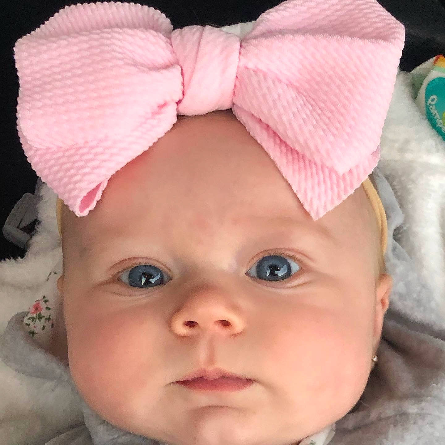 Kollins joined the competition — help win amazing prizes! baby, bonnet, cheek, child, clothing, ear, eye, face, fashion_accessory, forehead, hair_accessory, head, headband, headgear, lip, nose, organ, person, pink, skin