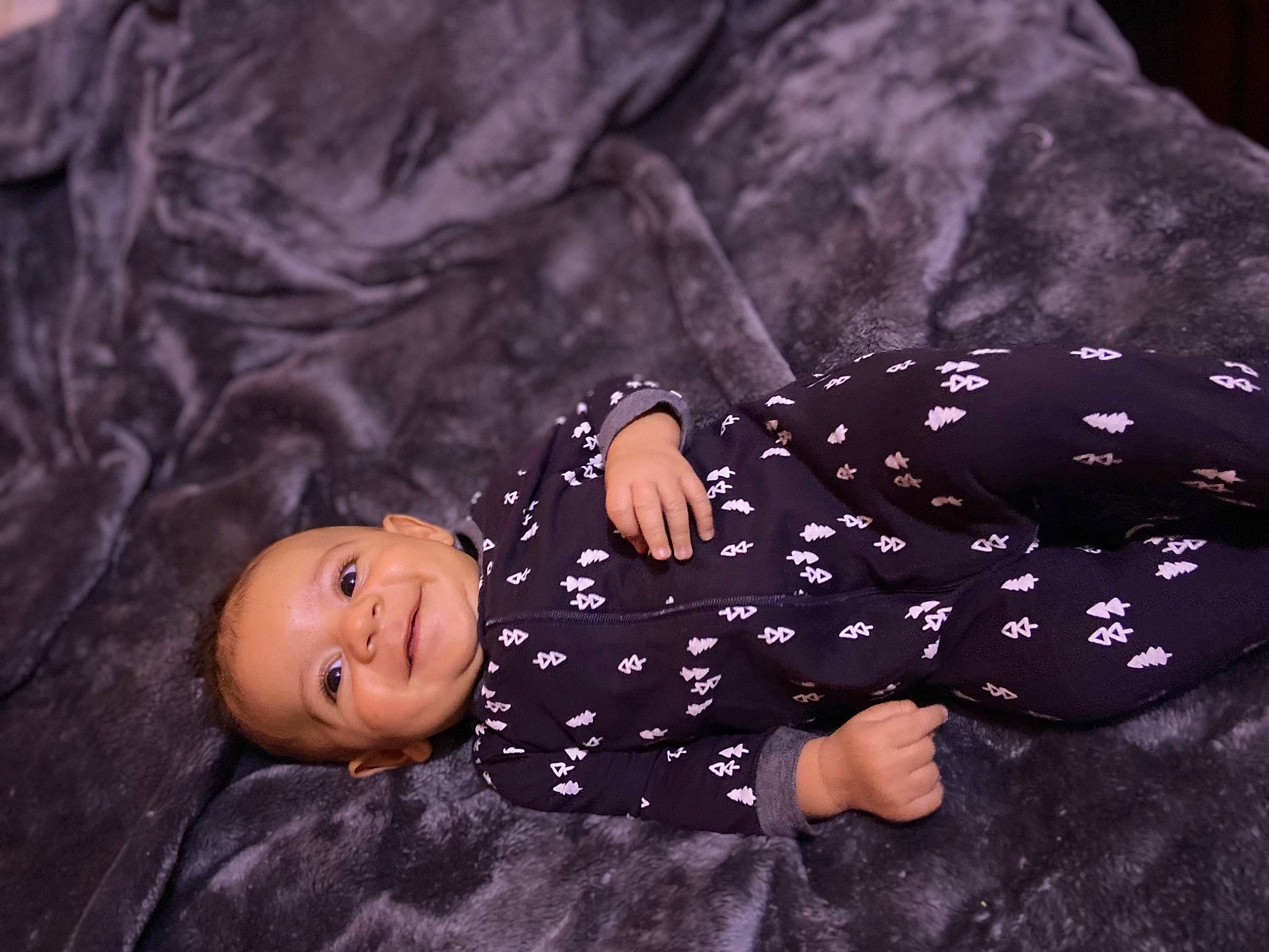 Desmond joined the competition — help win amazing prizes! baby, baby_toddler_clothing, comfort, darkness, flash_photography, flooring, fun, grass, happy, head, human_body, human_leg, joy, linens, magenta, pattern, person, purple, sitting, sleeve