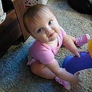 Lemailey joined the competition — help win amazing prizes! baby, child, infant, sitting, carpet, indoor, portrait, face, blue_eyes, blond_hair, pink_shirt, pink_shoes, purple_toy, toy, laundry_basket, furniture, home, candid, pouting, smiling